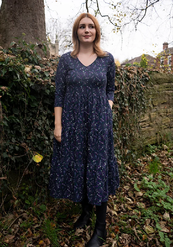Elowyn Midnight Mistletoe Sprig Tiered Hem Midi Dress Must-have midi dresses for this season