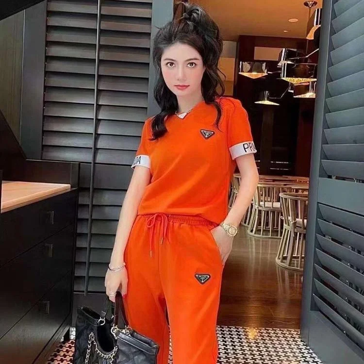 Latest Orange Track Set For Women Polka dot unclassified dresses
